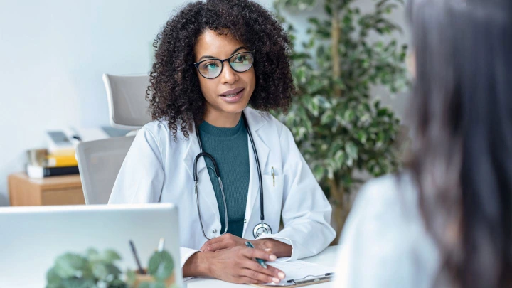 Doctor explaining ADHD diagnosis and consultation notes