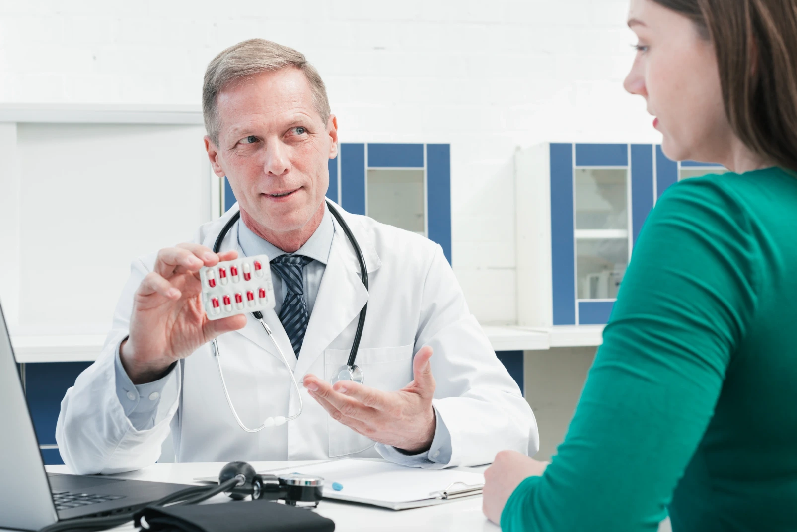 Medication management — doctor with patient