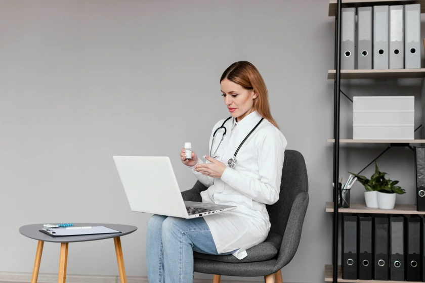 Doctor reviewing medication management process