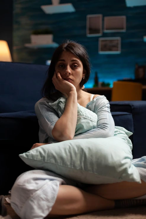 Woman finding relief from PMDD symptoms